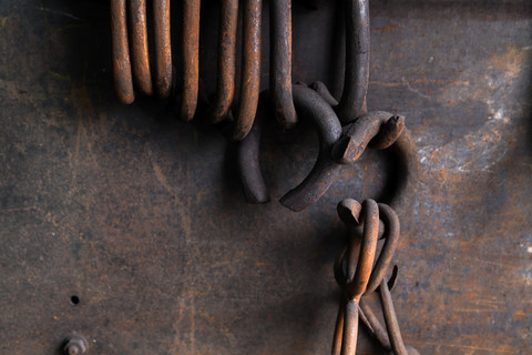 Germany, Bavaria, Josefsthal, rusty rings at historic blacksmith's shop stock photo