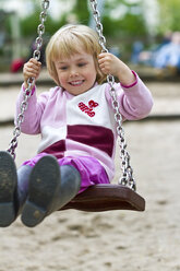 Little girl on swing - JFEF000342