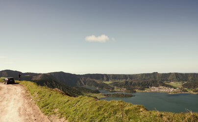 Portugal, Azores,Sao Miguel, Tourist capturing view - ONF000446