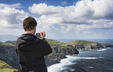 Portugal, Azores,Sao Miguel, Tourist capturing view - ONF000483