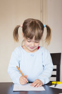 Portrait of little girl with green crayon - LVF001172