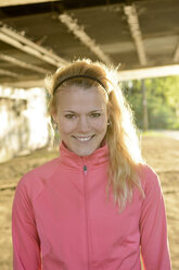 Portrait of smiling young woman - BFRF000405