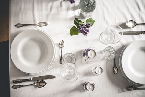 Festive laid table with lilac, Syringa, view from above - SBDF000900