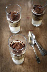 Three glasses of sugar-free rhubarb curd dessert with grated brown bread, elevated view - EVGF000565