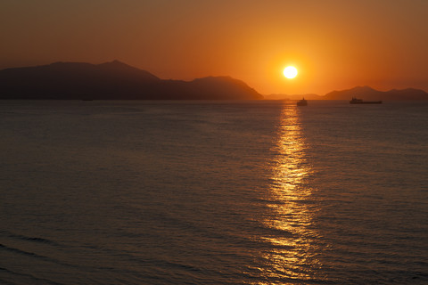 Spanien, Bilbao, Küste, Sonnenuntergang, lizenzfreies Stockfoto