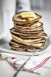 Stack of American pancakes with melting butter and maple syrup - SBDF000922