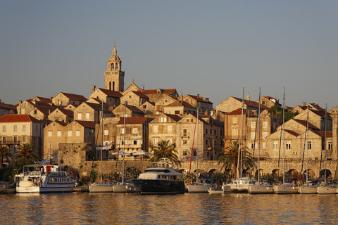 Croatia, Dubrovnik-Neretva, Korcula Island, Korcula, Cityscape and harbour in the evening stock photo