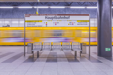 Germany, Berlin, modern architecture of subway station Hauptbahnhof, central station, with moving underground train - NKF000126