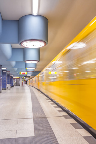 Germany, Berlin, subway station Nauener Platz with moving underground train stock photo