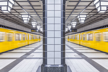 Germany, Berlin, subway station Paracelsiusbad with moving underground train - NKF000143