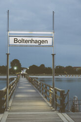 Germany, Mecklenburg-Western Pomerania, Boltenhagen, Baltic Sea, Landing stage in the evening, Sign - MEMF000110