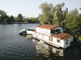 The Netherlands, Amsterdam, Amstel river with house boats, - HAWF000232