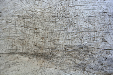 Withered and scratched wooden table, partial view - AXF000688