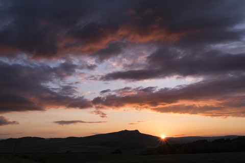 Germany, Baden-Wuerttemberg, Constance district, Hegau, Sunset with Hohenstoffeln stock photo