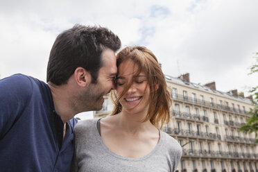 France, Paris, couple having fun - FMKF001303