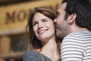 France, Paris, portrait of happy couple having fun - FMKF001314