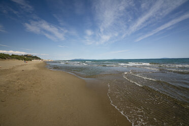 Italy, Tuscany, Castiglione della Pescaia, Beach and Island Elba in the background - MYF000416