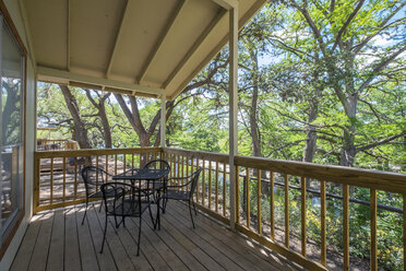 USA, Texas, Back porch of vacation home at the Frio River - ABAF001379