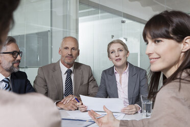 Germany, Munich, Businesspeople in meeting - RBYF000559