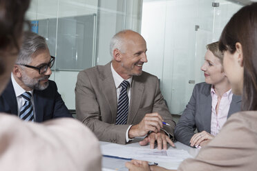 Germany, Munich, Businesspeople in meeting - RBYF000560