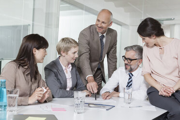 Germany, Munich, Businesspeople in meeting - RBYF000565