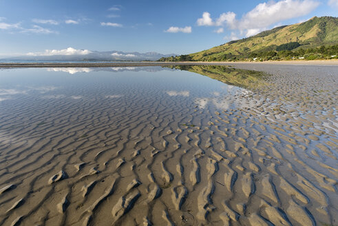 New Zealand, Tasman, Golden Bay, Pakawau, reflections of clouds in the water and structures in the sand at low tide - SHF001439