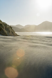 New Zealand, Golden Bay, Wharariki Beach, wind patterns and reflections in a sand dune - SHF001458