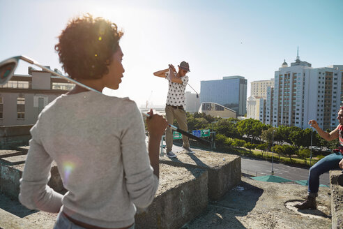 Friends playing urban golf in the city - VVF000152