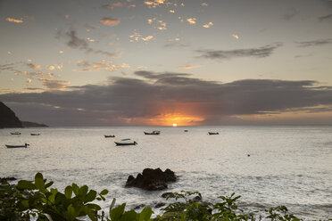 Caribbean, Trinidad and Tobago, Tobago, Castara, sunset over the ocean - SKF001587