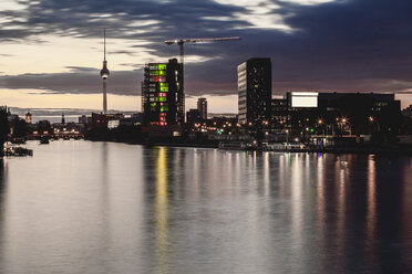 Germany, Berlin, Friedrichshain-Kreuzberg, Spree river, Berlin TV Tower in the background, in the evening twilight - ZMF000313