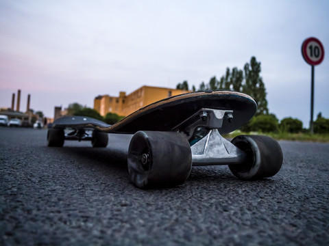 Germany, Berlin, Oberschoeneweide, Skateboard, Longboard, Shlongboard on a street stock photo