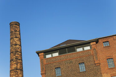 Germany, Cologne Widdersdorf, historic fabric formerly brewery converted to residential house - GWF003560