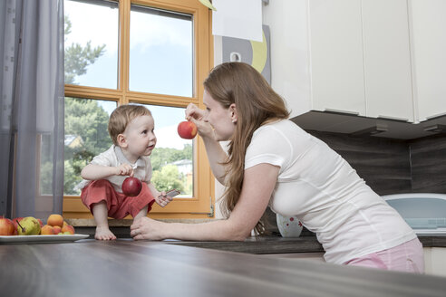 Mother with baby boy in kitchen - VTF000326
