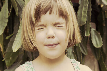 Portrait of little girl with closed eyes pouting mouth - LVF001491