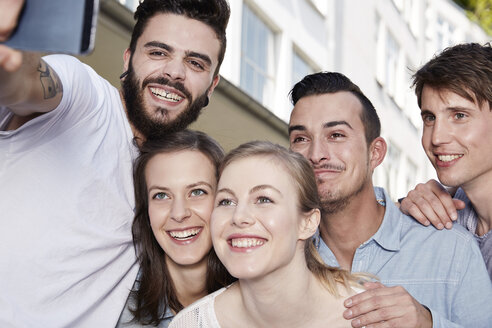 Group of friends taking selfie outdoors - STKF000911