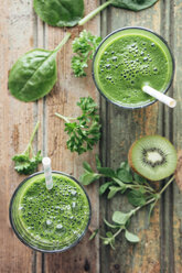 Green vegetable and fruit smoothie with spinach, salad, parsley, cress, oregano and kiwi - IPF000147