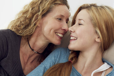 Portrait of mother and daughter having fun at home - STKF001022