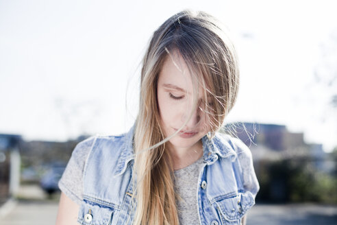 Portrait of young serious looking woman with closed eyes - FEXF000092