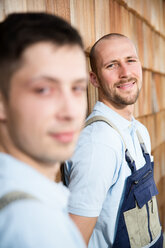 Two craftsmen at wooden wall - FKCF000008