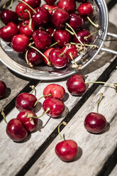 Fresh cherries in a colander - SARF000702
