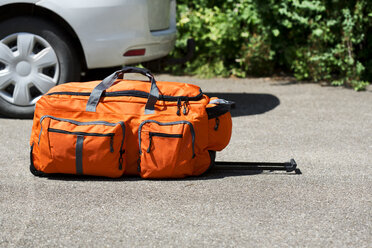 Germany, Bavaria, Wheeled luggage on floor - MAEF008672