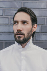 Portrait of young man wearing white shirt - MFF001143