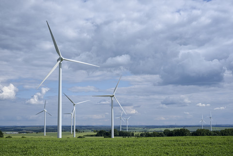 Germany, Saxony, Wind turbines on field stock photo