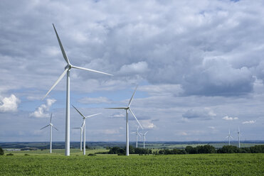 Germany, Saxony, Wind turbines on field - ELF001163