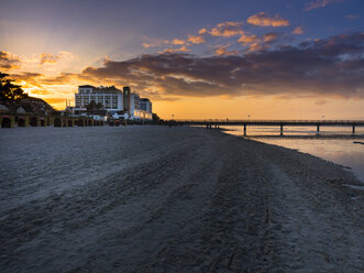 Germany, Schleswig-Holstein, Scharbeutz, Bayside Hotel at the beach at dusk - AMF002491