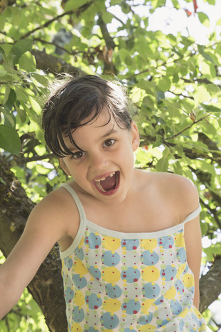 Portrait of little girl with open mouth stock photo