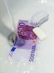 Money laundering, money, bank note under water - ESF001279