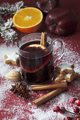 Glass of mulled wine with slice of orange and cinnamon stick - CSF022005