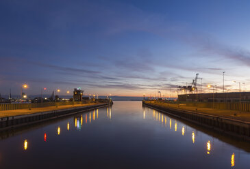 Germany, Bremerhaven, Open lock in the evening - SJF000118