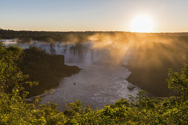 South America, Brazil, Parana, Iguazu National Park, Iguazu Falls against the evening sun - FOF006706